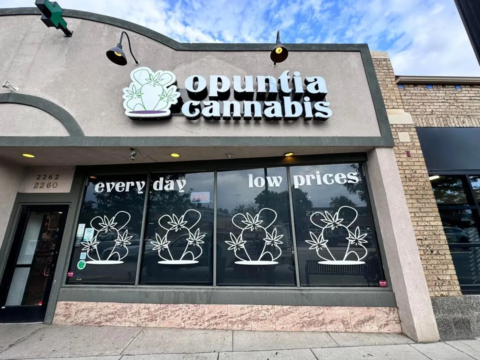 Opuntia Cannabis storefront with dimensional letters and white window graphics